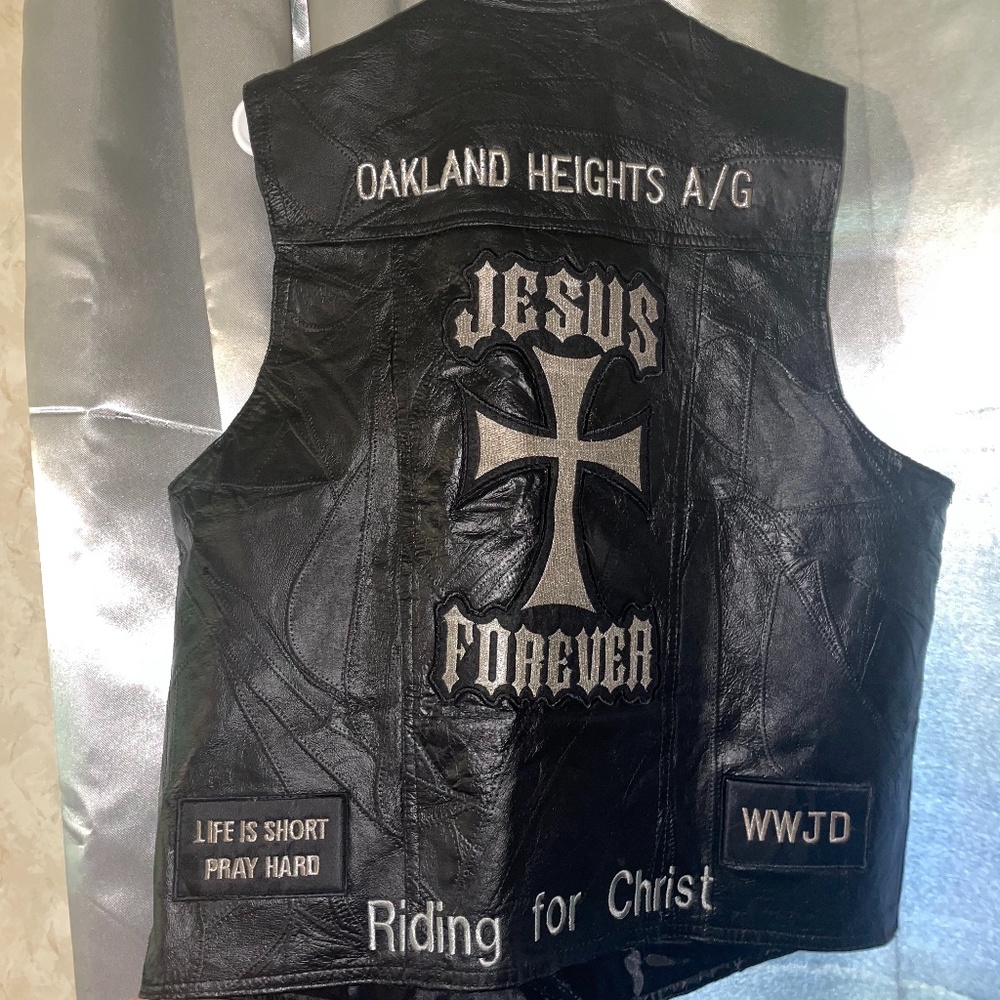 Leather biker’s jacket with Christian patches,